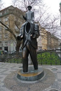 Kafka statue at the beginning of the Jewish quarter